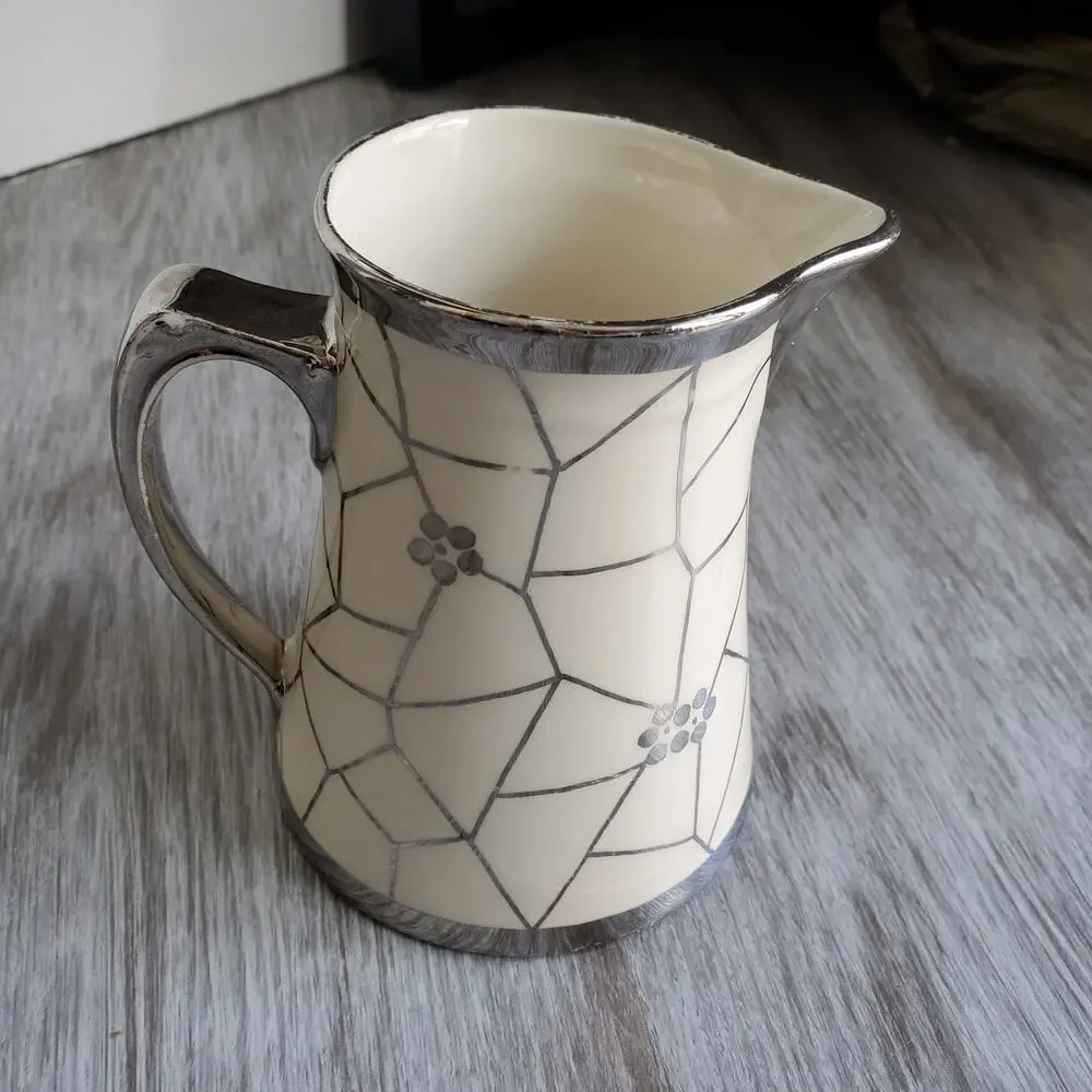 Cream and Silver Ceramic Pitcher